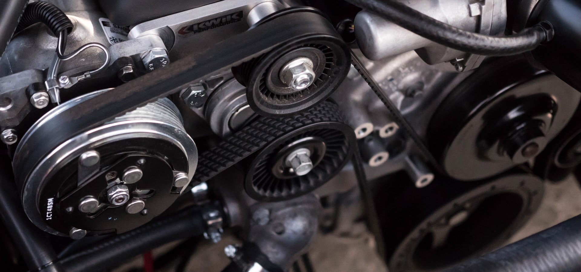 Precision automotive engine and belt assembly